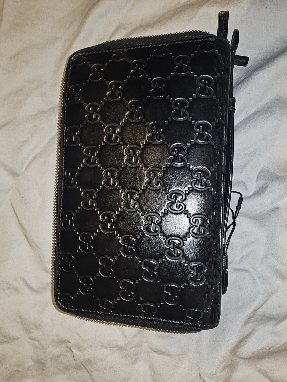 Gucci Black Embossed GG Zip-Around Travel Wallet